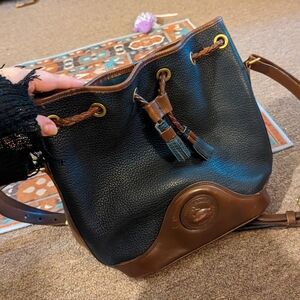 Dooney and bourke purse- damaged.